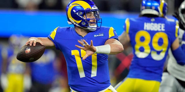 Los Angeles Rams quarterback Baker Mayfield throws a pass against the Las Vegas Raiders, Thursday, Dec. 8, 2022, in Inglewood, California.