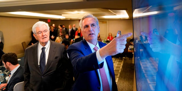 Former Speaker of the House Newt Gingrich and House Minority Leader Kevin McCarthy (R-Calif.) watch election results in a room with staffers at the Madison Hotel in Washington, D.C. on November 8, 2022.