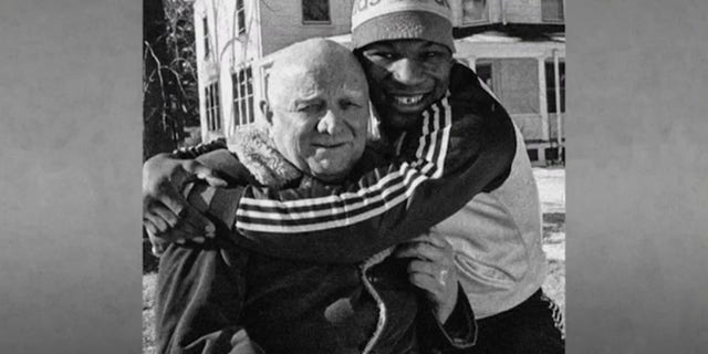 Boxing legend Mike Tyson with his trainer and mentor, Cus D'Amato