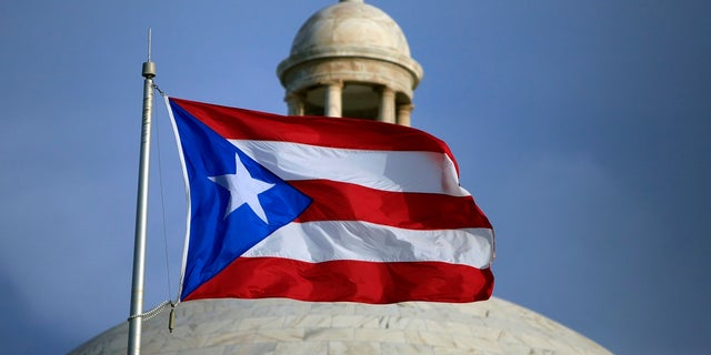 Puerto Rico has discussed ways to change its political status for years, but with no clear result. (AP Photo/Ricardo Arduengo, File)