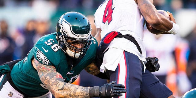 Chris Long (56) of the Philadelphia Eagles attempts to tackle Deshaun Watson (4) of the Houston Texans during the second half at Lincoln Financial Field Dec. 23, 2018, in Philadelphia.
