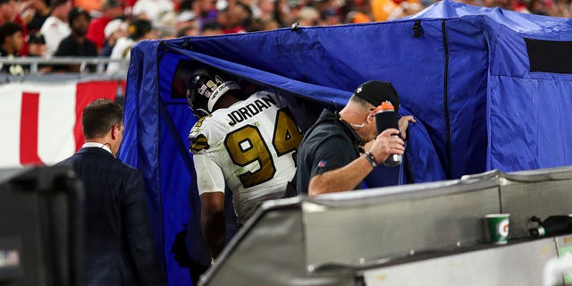 Cameron Jordan of the New Orleans Saints walks into the injury tent on the sideline during the fourth quarter of a game against the Tampa Bay Buccaneers at Raymond James Stadium Dec. 5, 2022, in Tampa, Fla. 