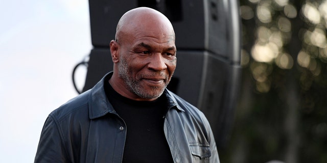 Former professional boxer Mike Tyson attends Celebration of Smiles Event hosted by Dionne Warwick on her 81st Birthday to benefit medical charity organization, Operation Smile and The Kind Music Academy on December 12, 2021 in Malibu, California. 