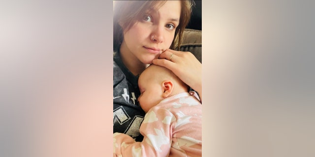 Folichia Mitchell and her daughter, Kennedy. The baby recently spent a month in the hospital after she swallowed a water bead.