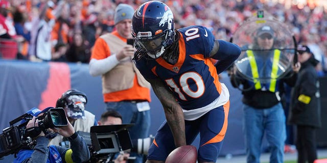Denver Broncos wide receiver Jerry Jeudy (10) celebrates his touchdown catch during the first half of a game against the Kansas City Chiefs Sunday, Dec. 11, 2022, in Denver. 