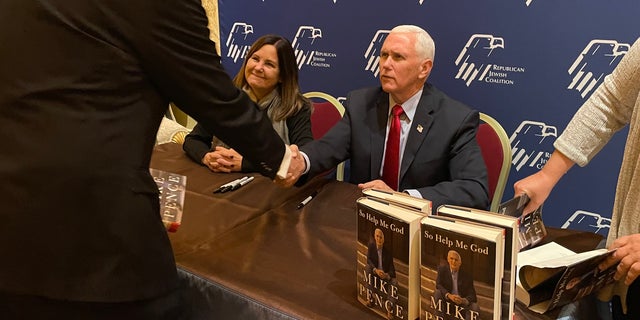 Former Vice President Mike Pence and his wife Karen at a book signing at the Republican Jewish Coalition's annual leadership conference Nov. 18, 2022, in Las Vegas