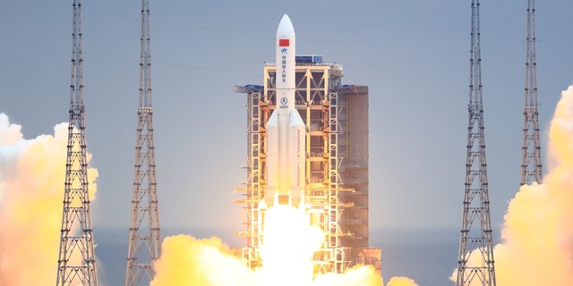 A Long March-5B Y2 rocket carrying the core module of China's space station, Tianhe, blasts off from the Wenchang Spacecraft Launch Site on April 29, 2021, in Wenchang, Hainan Province of China. 