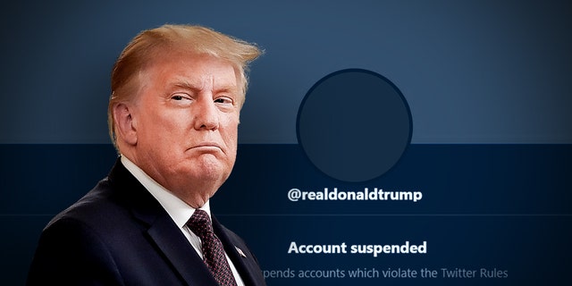 A photo of Donald Trump with his suspended Twitter account.
