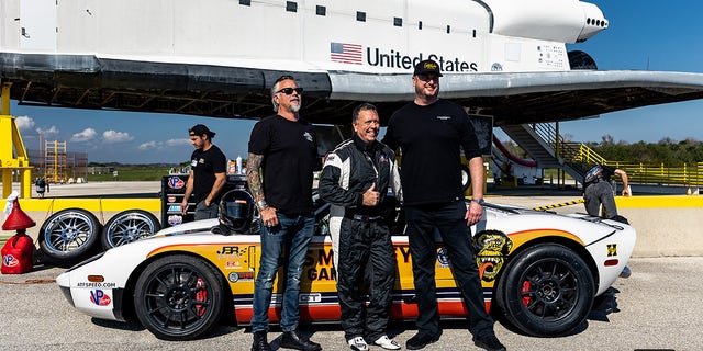 Gas Monkey Garage owner Richard Rawlings (left) sponsors Johnny Bohmer (center) and the BADD GT project.